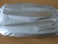 Przykrywamy folią aluminiową i pieczemy przez 45...